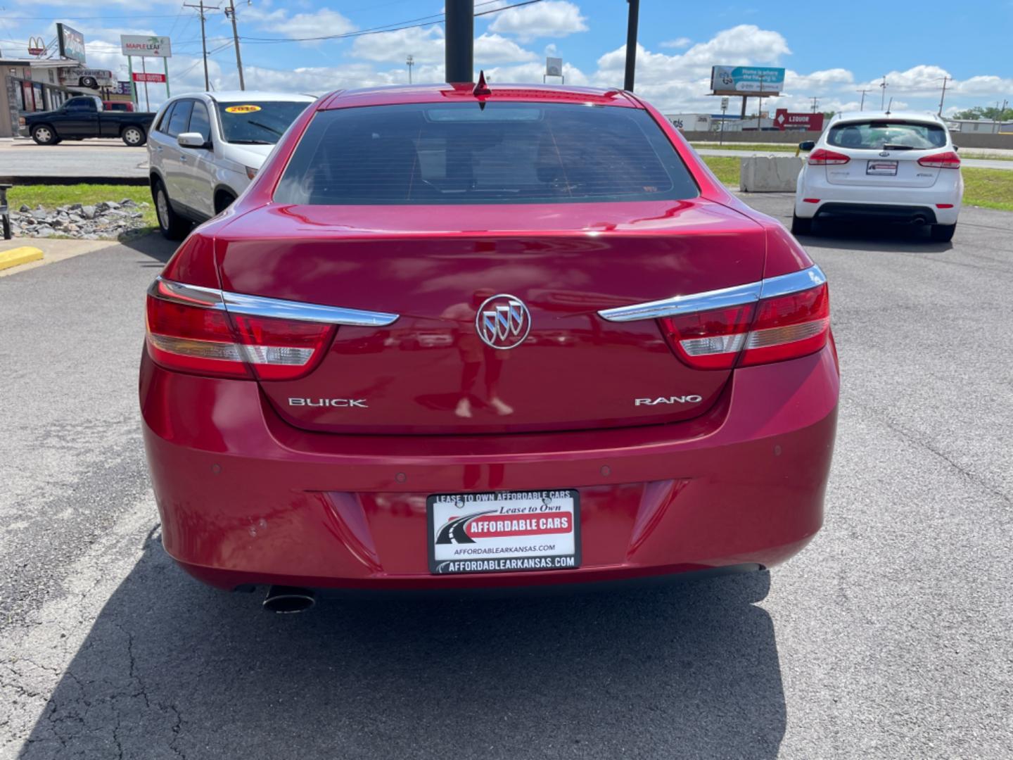 2014 Maroon Buick Verano (1G4PR5SK6E4) with an 4-Cyl, ECOTEC, 2.4 Liter engine, Auto, 6-Spd w/Shft Ctrl transmission, located at 8008 Warden Rd, Sherwood, AR, 72120, (501) 801-6100, 34.830078, -92.186684 - Photo#6